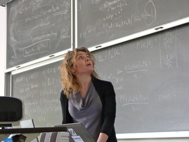 francesca tosi teaching at chalkboard